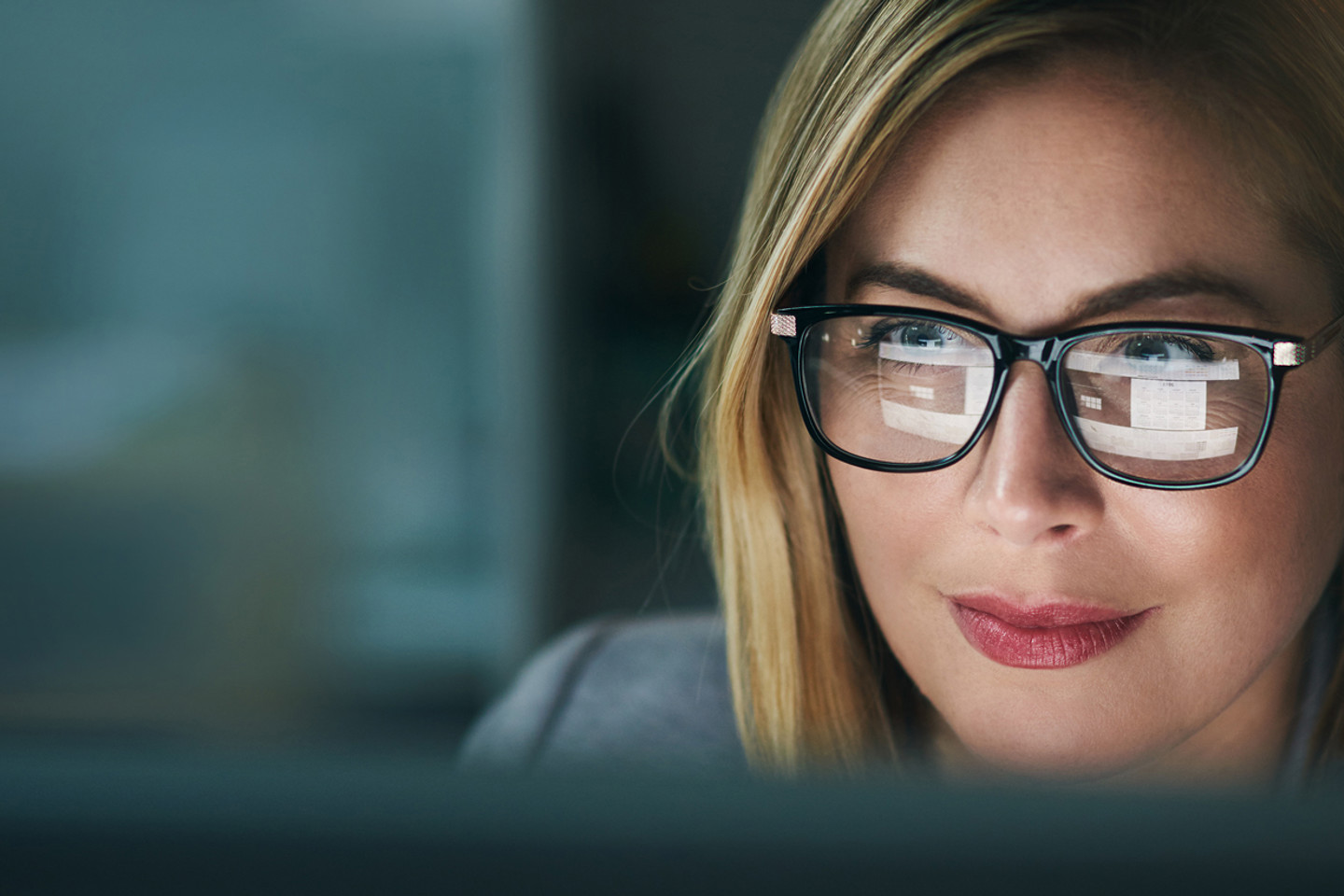 Woman working at computer in office