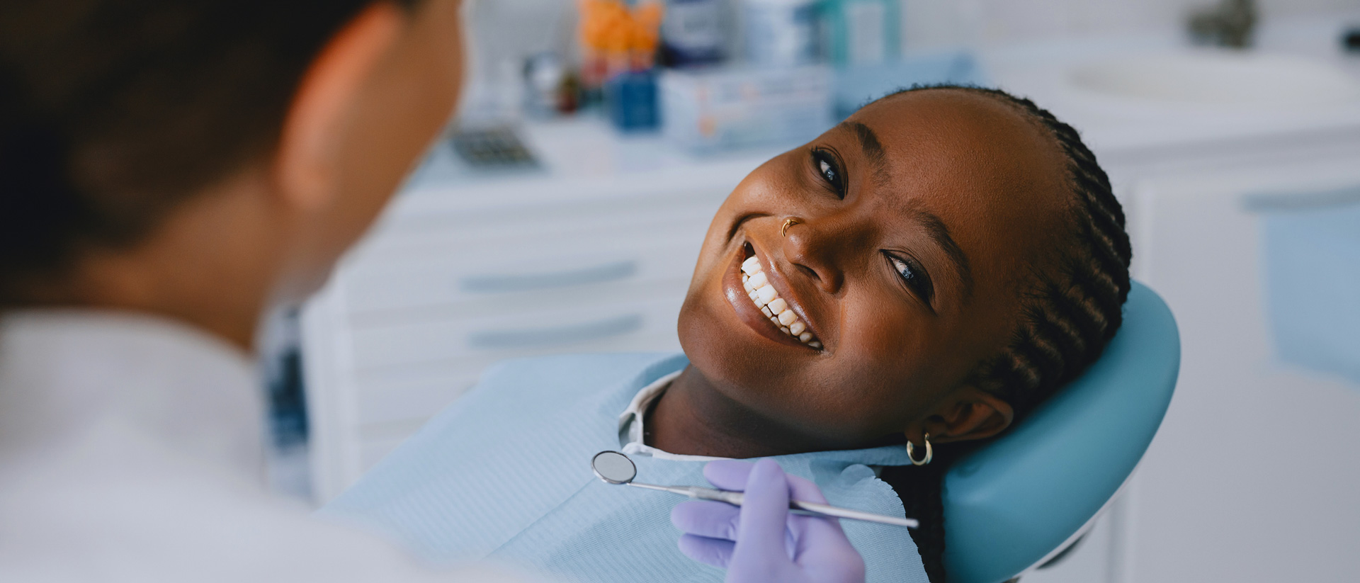 Smiling patient at dentist appointment