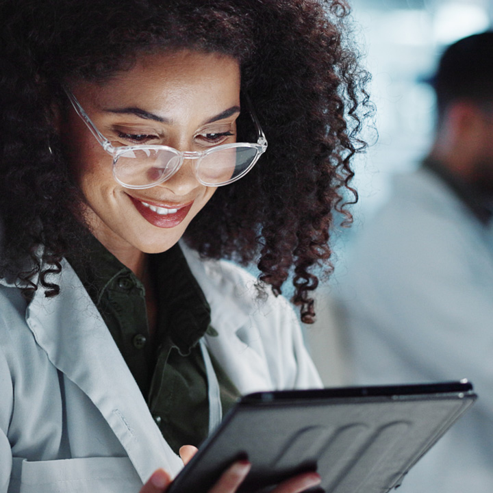Vet looking at data on a tablet