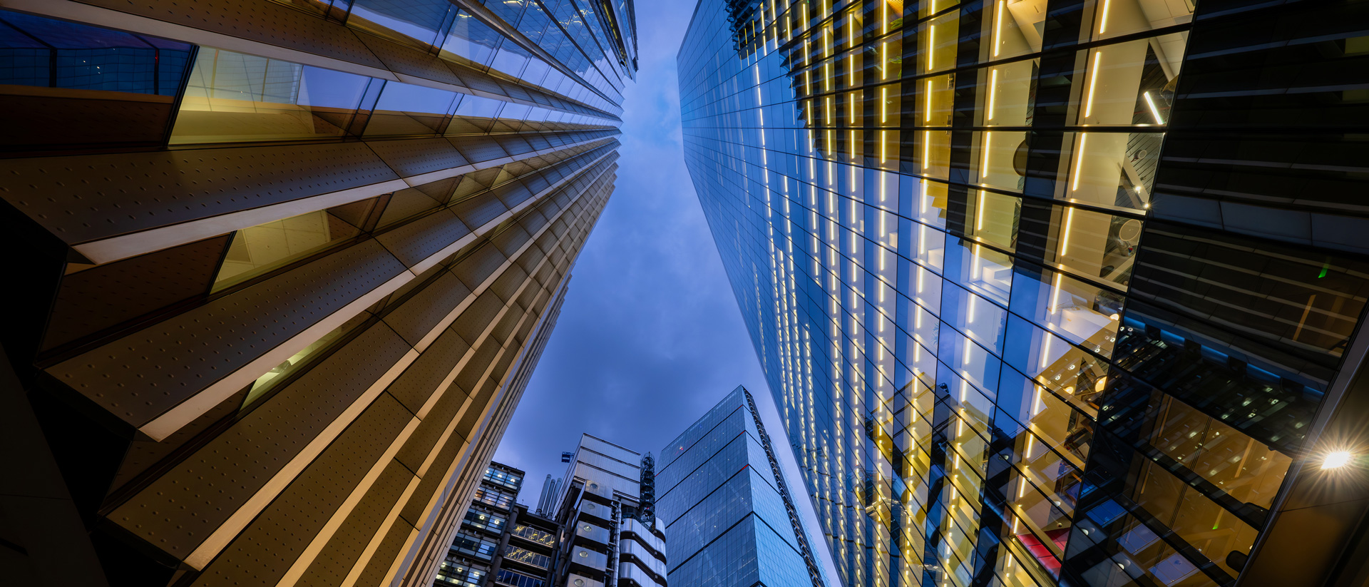 View looking up at skyscraper office buildings
