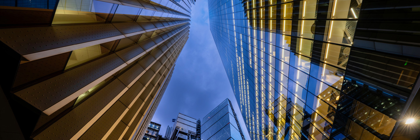 View looking up at skyscraper office buildings
