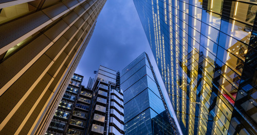 View looking up at skyscraper office buildings
