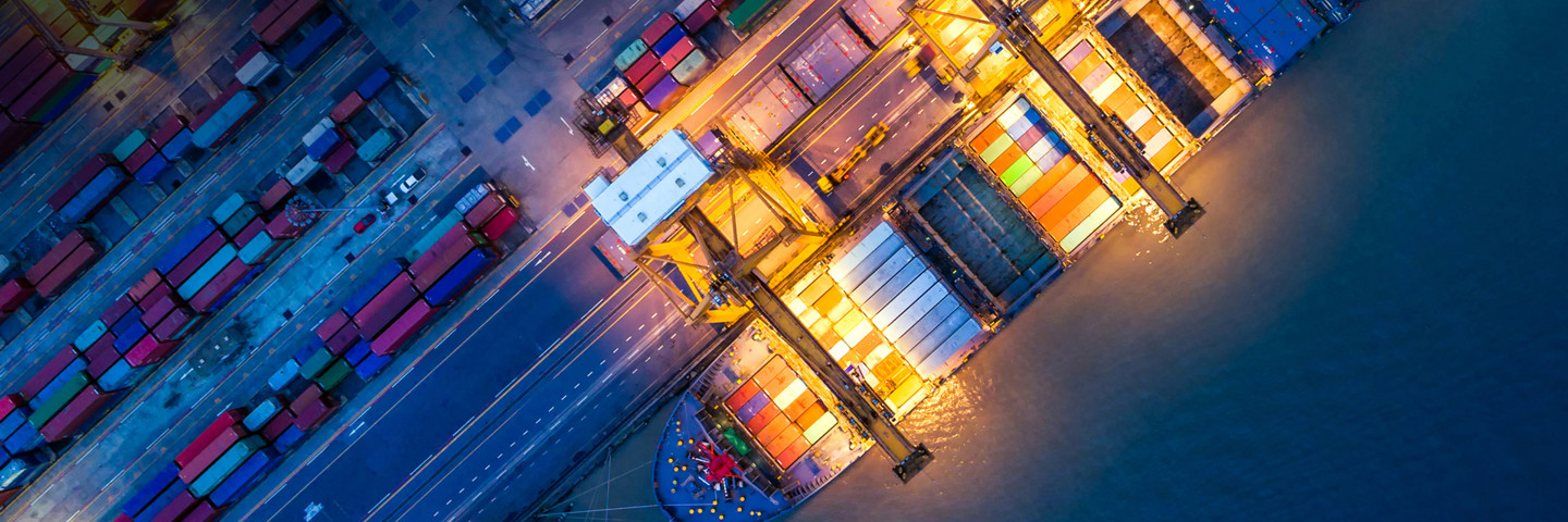 Aerial view of a cargo ship at night