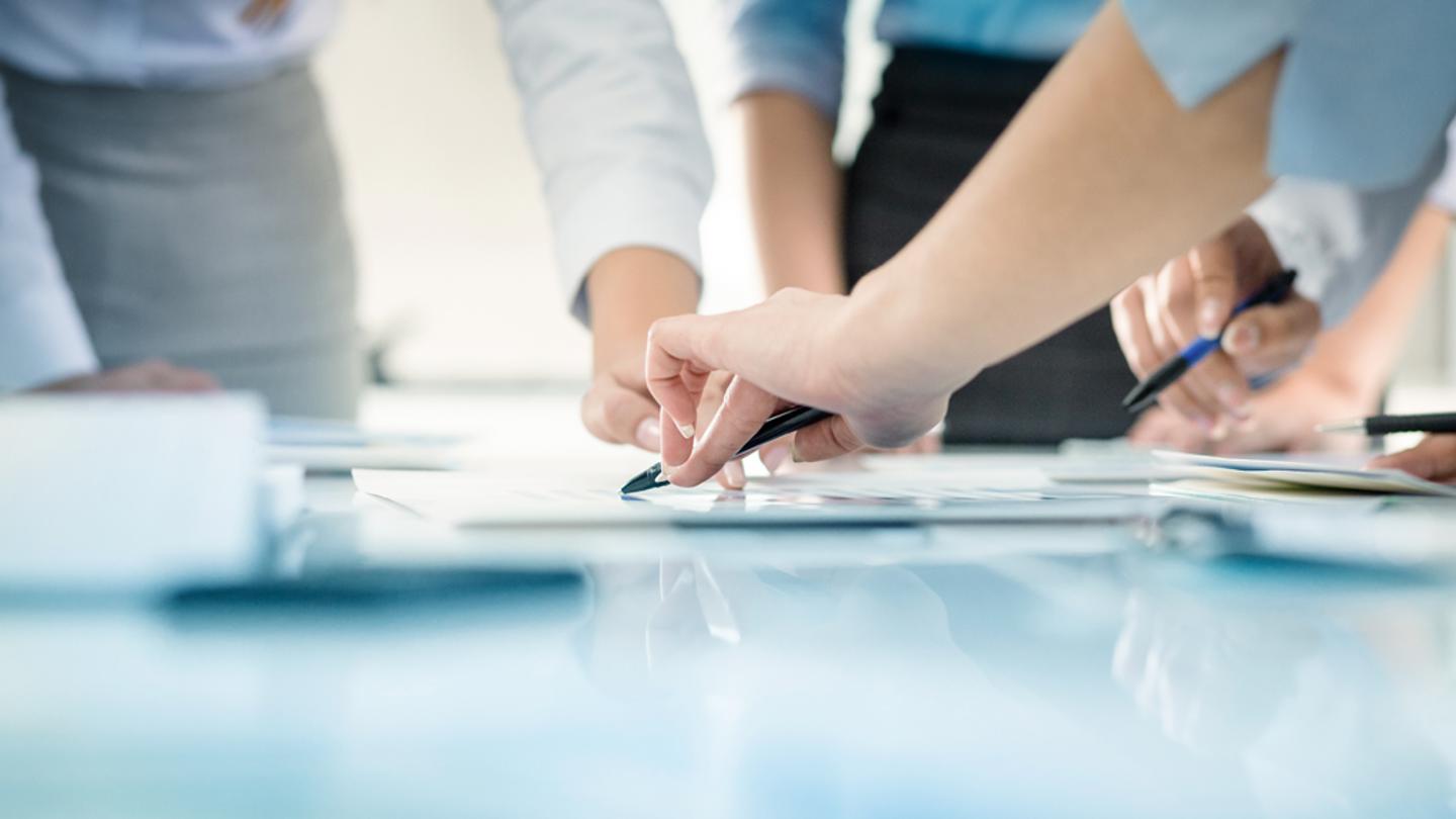 Colleagues collaborating in the office