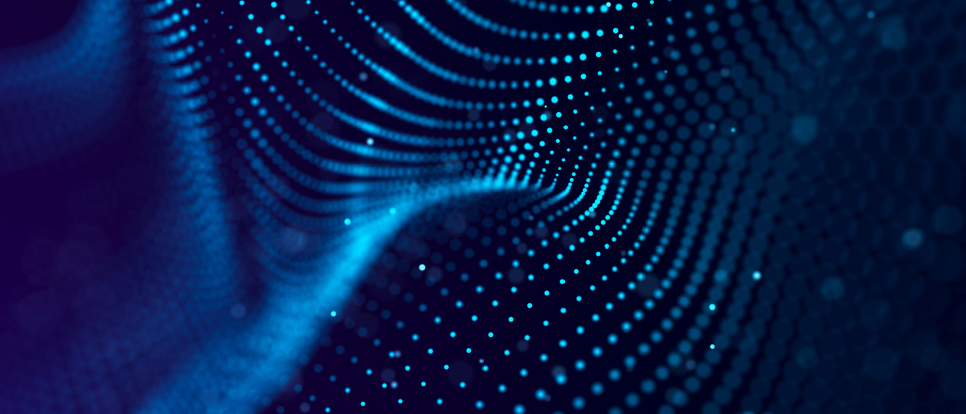 Abstract glowing blue dots in a curved shape