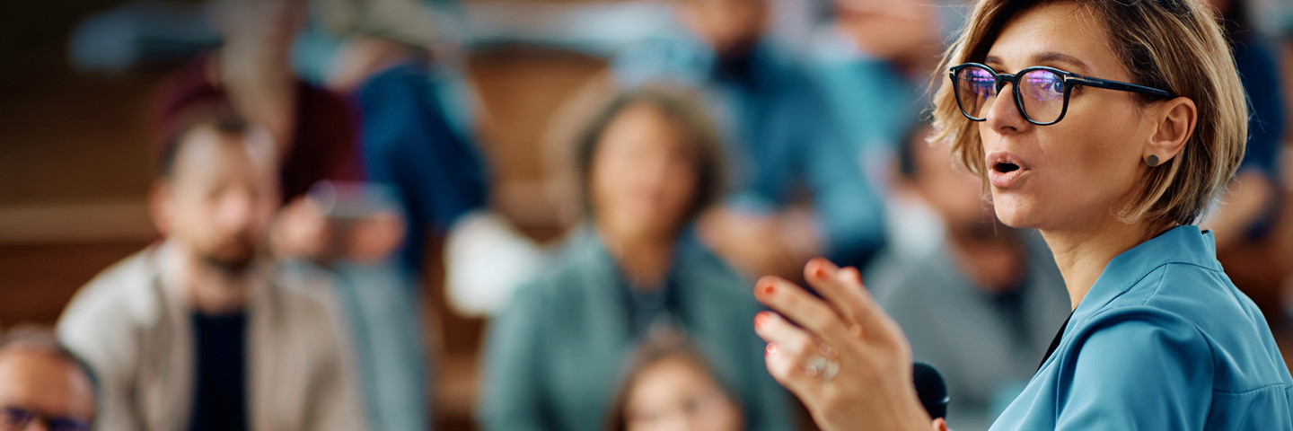 Image of woman making a speech